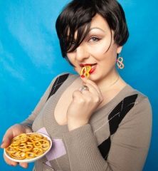 Lady Eating Pretzel by Marina Diakova cropped